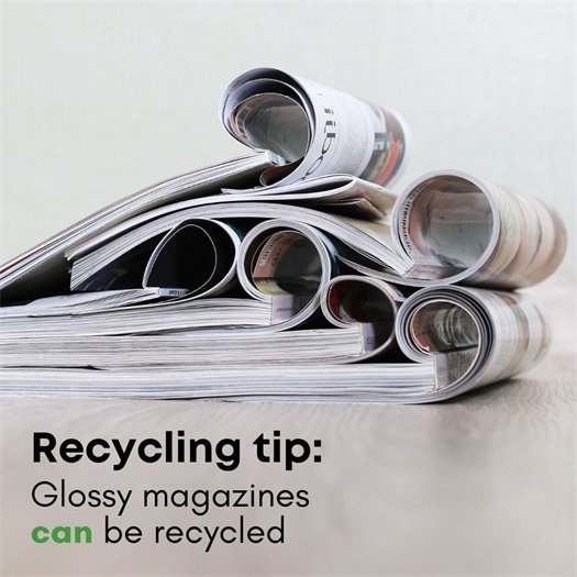 Photo of several glossy magazines in a stack.