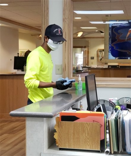 Last week we introduced you to Bruce Erickson, who is one of two employees tasked with sanitizing the Town's offices. Facilities Maintenance Technician Nehmias Cortez, pictured here, shares sanitizing responsibilities with Bruce. Bruce and Nehmias move through our offices silently and efficiently, only pausing to say a quick hello or hide from a photographer. 