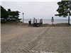 Wooden Stairs Leading to Beach With Water in Background