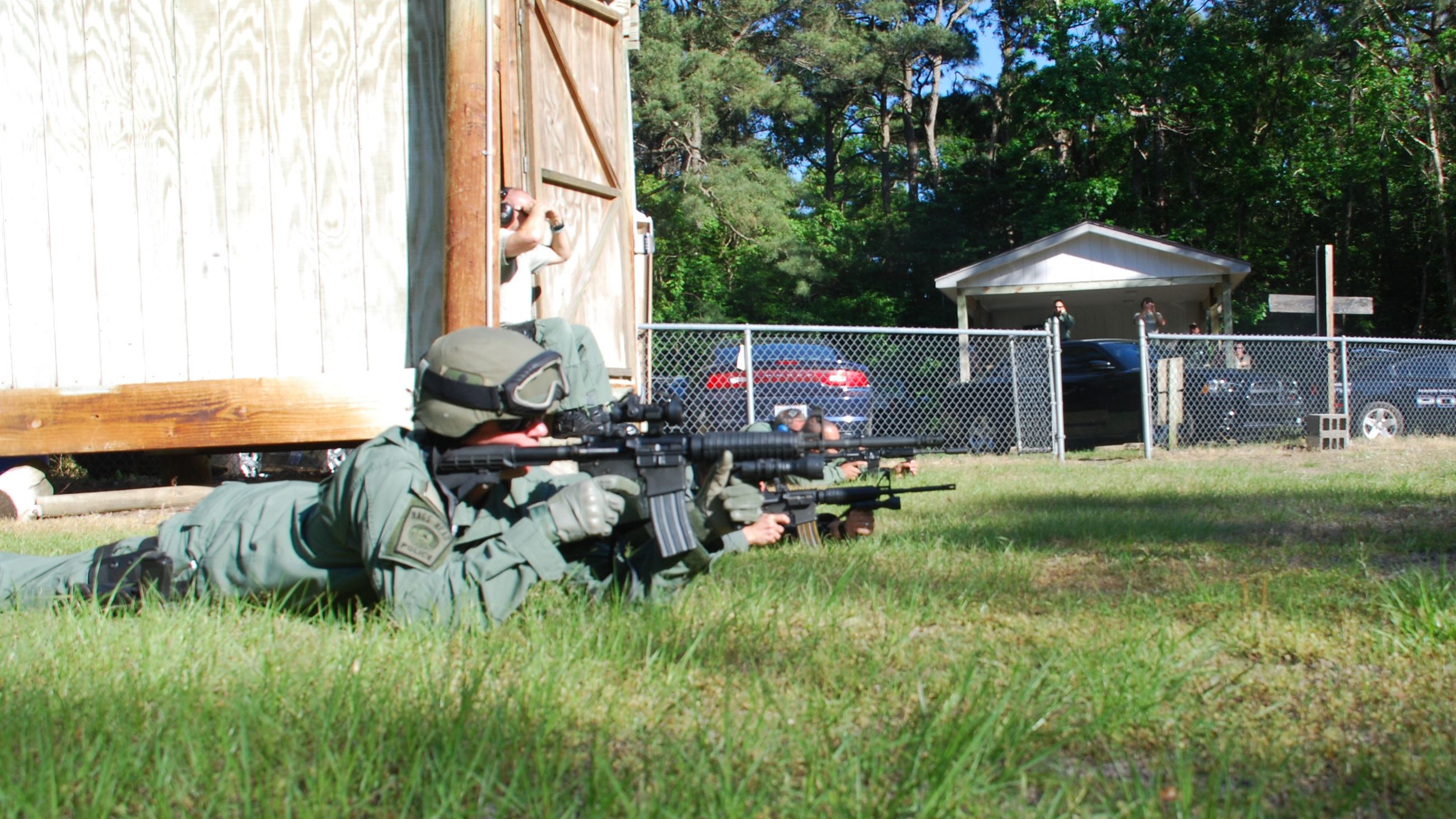 Officer Laying Down and Scoping Out Shot
