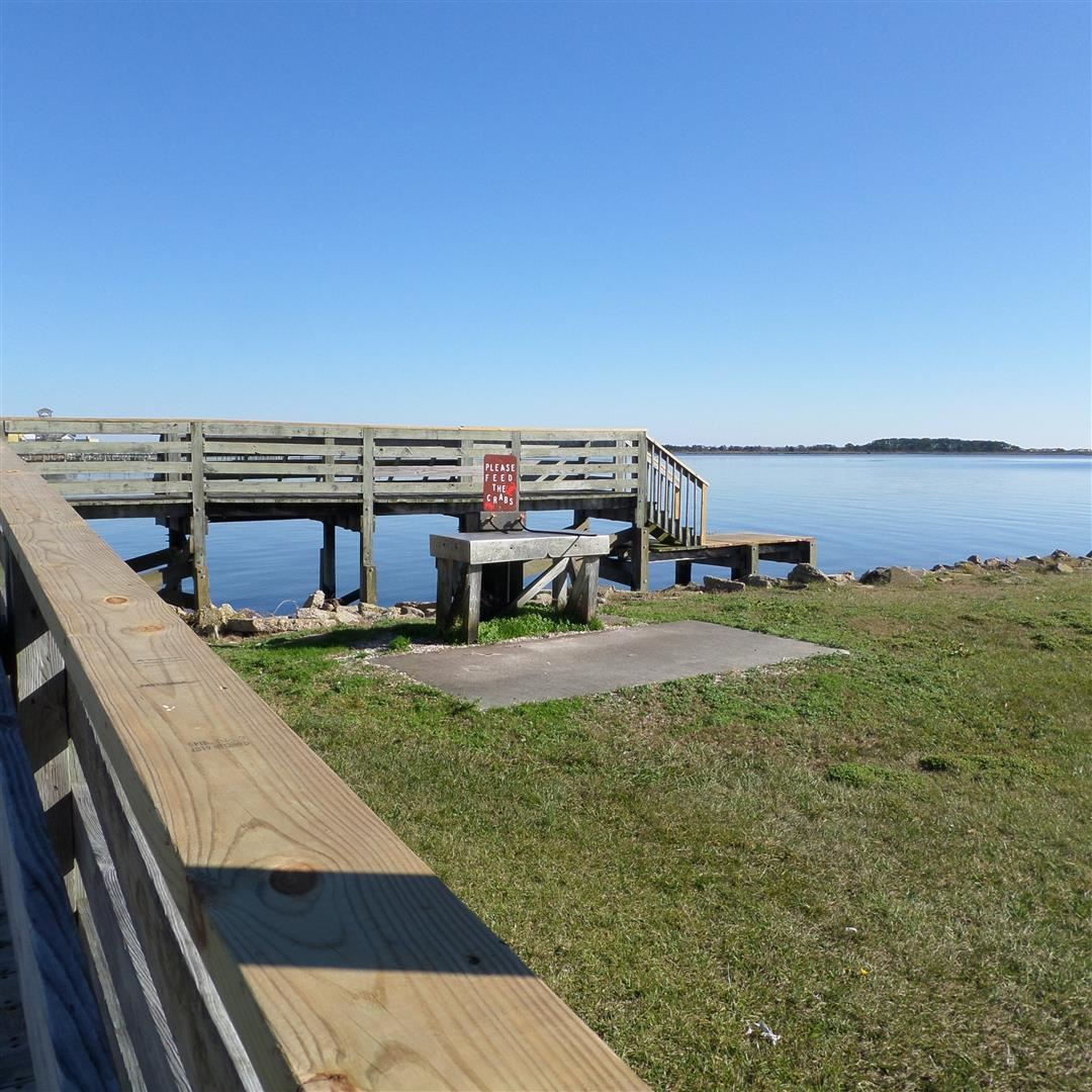 Wooden Walkway Leading to Water