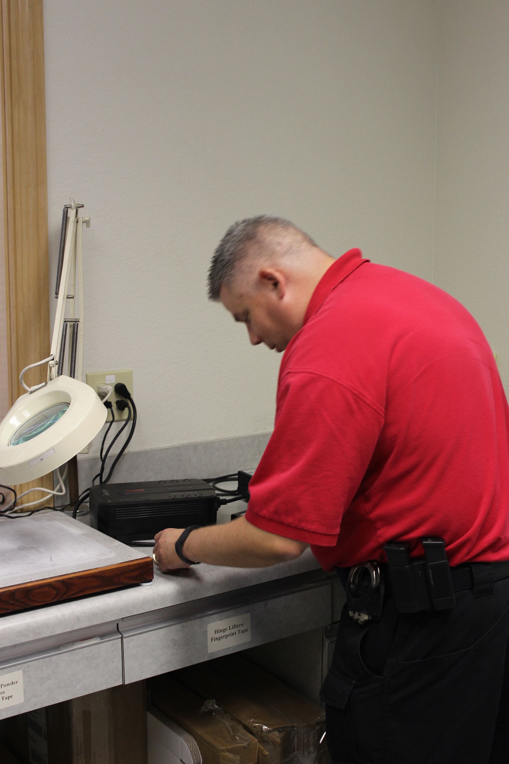 Police officer using equipment